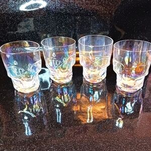 Set of 4 Iridescent Skull Glasses.